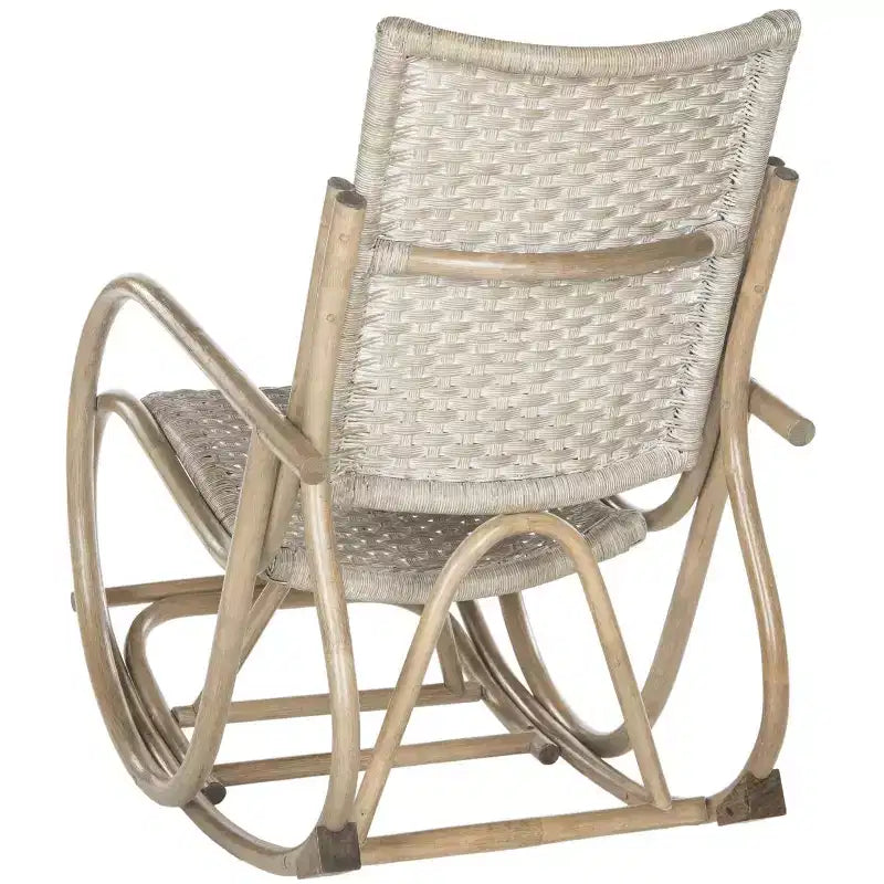 Sedia a dondolo in rattan con struttura laccata