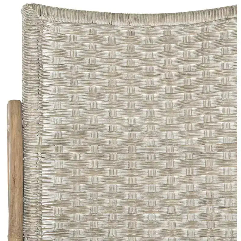 Sedia a dondolo in rattan con struttura laccata
