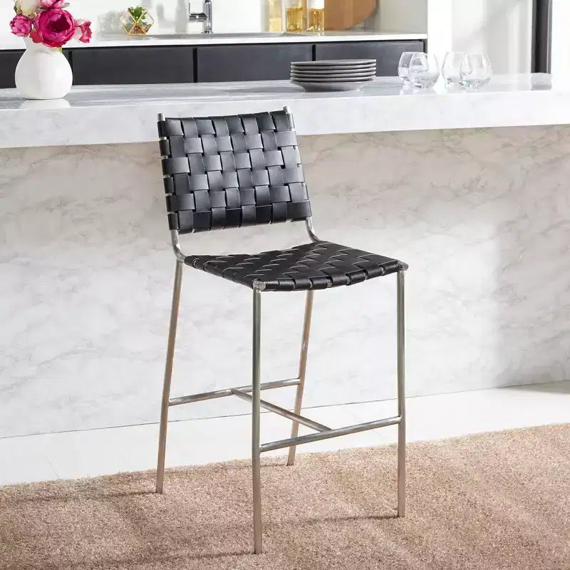 Sgabello da bancone in pelle intrecciata con struttura in metallo